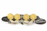 Gold Coins Standing On Silver Coins Stock Photo