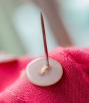 Sewing Button Means Thread Tailor And Needles Stock Photo