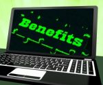 Benefits On Laptop Showing Monetary Compensations Stock Photo