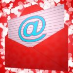 At Envelope Shows Email Message And Correspondence Stock Photo