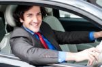 Young Businessman Driving His Car Stock Photo