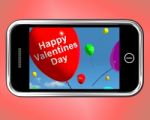 Happy Valentines Day On Mobile Stock Photo