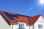 House Roof Covered With Solar Panel Stock Photo