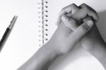 Close Up Of Man's Hands In Spiral Notepad Stock Photo