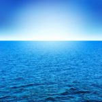 Blue Sea And Sky With Sunlight Stock Photo