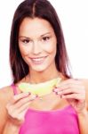 Woman Holding Slice Of Yellow Melon Stock Photo