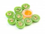 Green Multiple Scented Sesame Chinese Sweet Around Liquid Sugar On White Floor Stock Photo