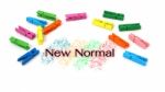New Normal Text With Colorful Clips Background Stock Photo
