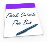 Think Outside The Box Notepad Means Unique Thoughts Stock Photo