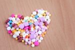 Heartshape Pills Stock Photo