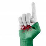 Wales Flag On Pointing Up Hand Stock Photo
