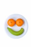 Fun Fruit Face With Banana And Oranges Stock Photo