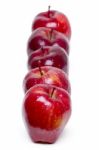 Fresh And Healthy Red Apples In A Row Stock Photo