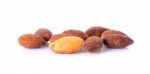 Salted And Roasted Almonds On White Background Stock Photo