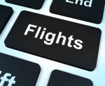 Flights Computer Key For Overseas Vacation Or Holiday Booking Stock Photo