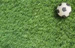 Football On Grass Stock Photo