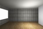 Empty Room With Bare Concrete Wall And Wood Floor Stock Photo