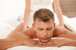 Young Man Getting A Massage Stock Photo