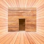 Stone Wall And Door In Wood Plank Room Stock Photo