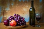 Fruits And Wine On  Table Stock Photo