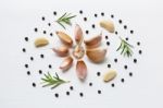 Garlic With Rosemary And Peppercorn Isolated On White Background Stock Photo