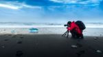 Photographer Take A Photo At Ice In Iceland Stock Photo