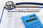 Medical Bill With Stethoscope Stock Photo
