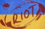 Ukraine Flag Painted On Old Concrete Wall With Riot Inscription Stock Photo