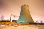 Thermal Power Plant And Cooling Towers At Night Stock Photo