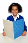Smiling School Girl Learning Weekly Assignment Stock Photo