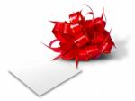 Red Bow And White Card Stock Photo