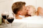 Couple Kissing In The Bath Stock Photo