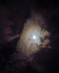 Full Moon Shining Glowing Light Through The Darkness Of Cloudy N Stock Photo