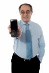 Senior Businessman With Blackberry Stock Photo