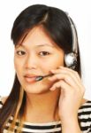 Woman Talking On Headset Stock Photo