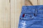 Blue Jean Skirt Design On Wood Background Stock Photo