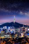 View Of Downtown Cityscape And Seoul Tower With Milky Way In Seoul, South Korea Stock Photo