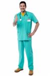 Smiling Doctor Showing Thumbs Up Stock Photo