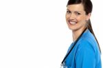 Smiling Doctor With Stethoscope Around Her Neck Stock Photo