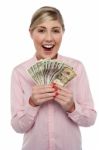 Attractive Young Woman Holding Money Stock Photo