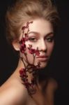 Young Woman With Flower Makeup Stock Photo
