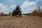 Man Riding Quad Bike Stock Photo