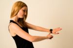 Young Woman Is Touching The Apple Watch Stock Photo