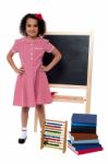 Smiling Little Girl In School Uniform Stock Photo