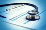 Stethoscope On Health Insurance Claim Form Stock Photo