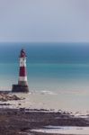 The Lighthouse At Beachey Head Stock Photo