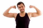 Strong Man Showing His Muscles Stock Photo