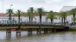 Tavira, Southern Algarve/portugal - March 8 : Bridge Over The Ri Stock Photo