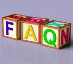 Wooden Block With Faq Text Stock Photo