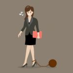 Business Woman With Weight Burden Stock Photo
